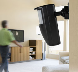 Image of Skylink Long Range Household Alert Motion Alert mounted on wall.